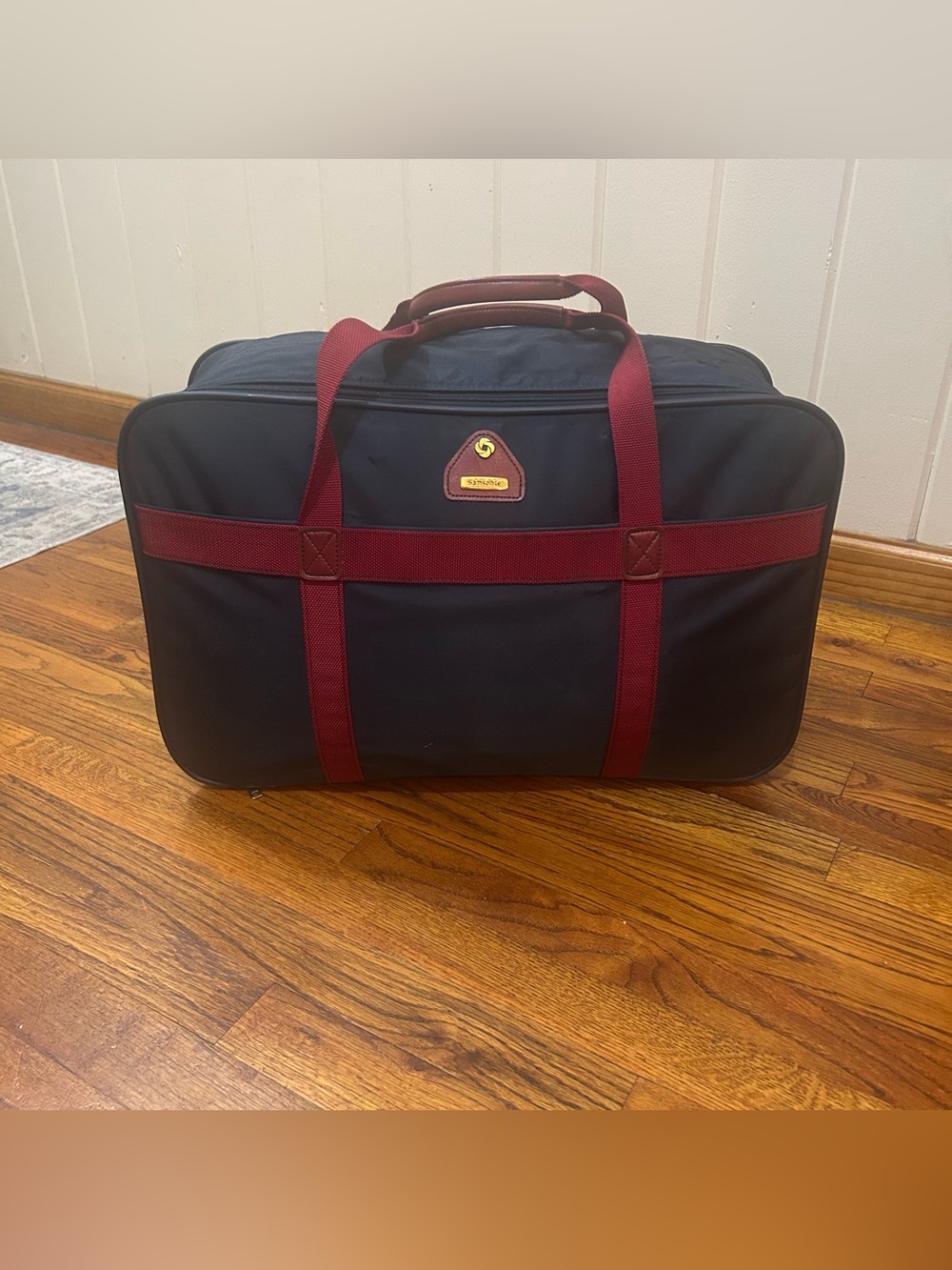 Vintage Samsonite Duffel Tote features a navy blue nylon body with contrasting r